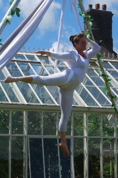 Lisa Truscott performing in silks loop at Scorrier House.